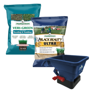 Two bags of Jonathan Green Veri-Green grass seed and Black Beauty Ultra grass seed and a blue broadcast spreader comprise a Small Lawn Starter Kit on a white background.