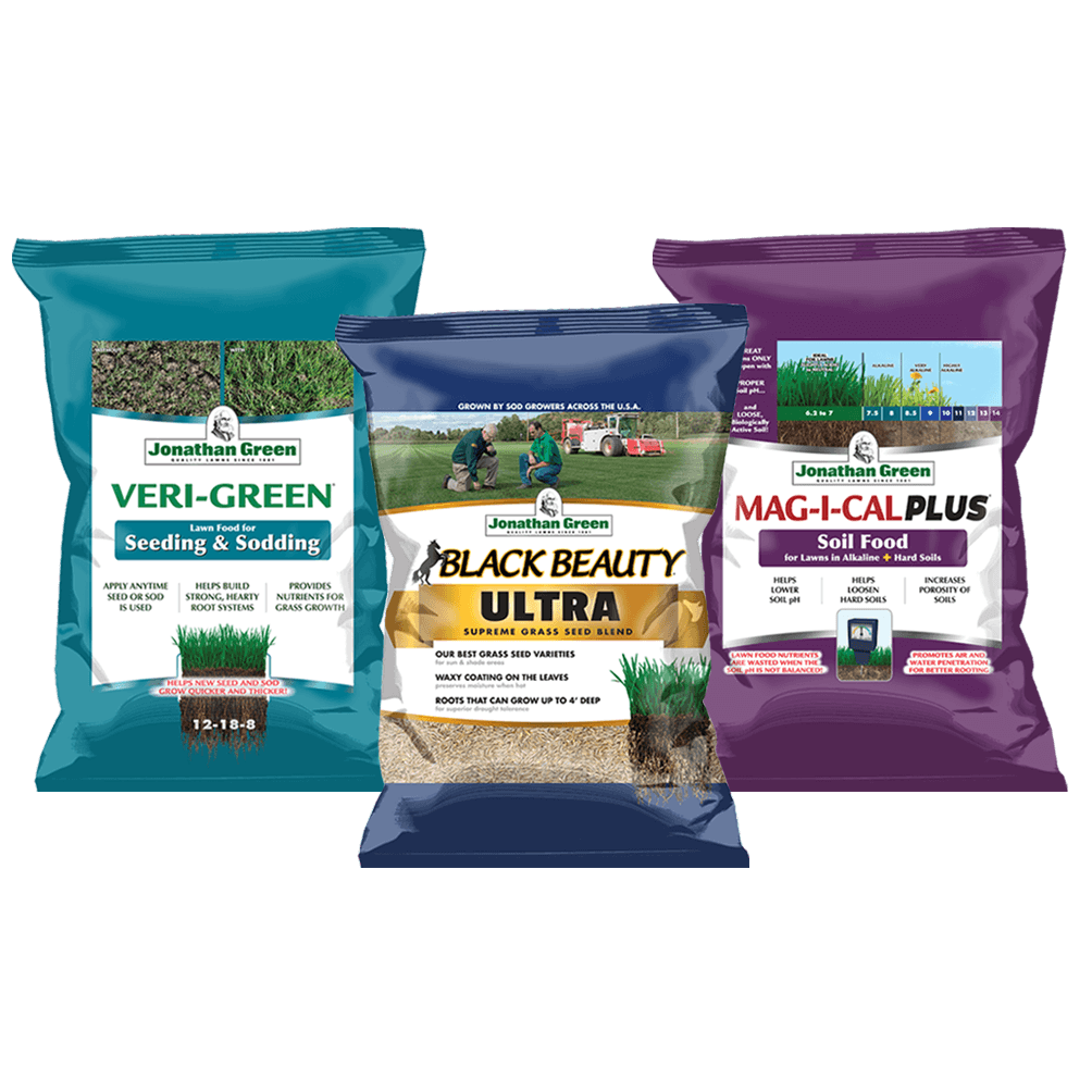 Three bags of Grass Seed & Fertilizer Bundle for Alkaline Soil: Seeding & Sodding, Black Beauty Ultra Grass Seed, and Mag-I-Cal Plus Soil Food for alkaline soil, arranged upright.