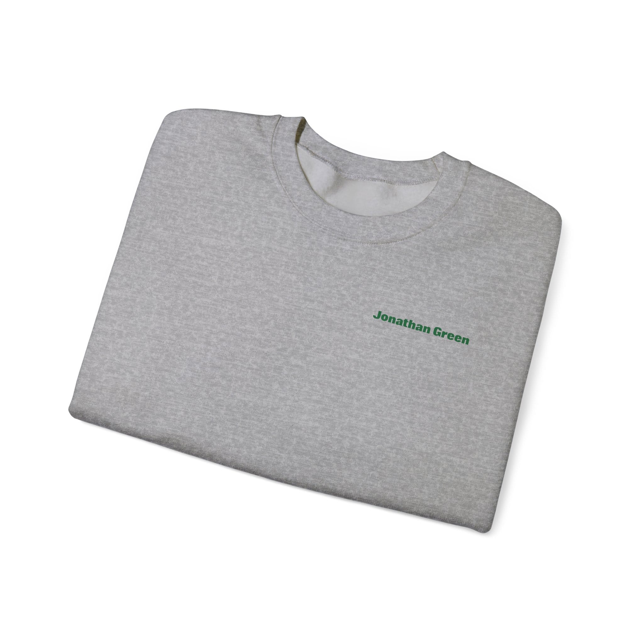 A folded light gray Sunday Lawn Club Heavy Blend™ Crewneck Sweatshirt with "Jonathan Green" embroidered in small green letters on the left chest area.
