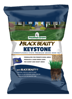 Bag of Black Beauty® Sun & Shade Grass Seed on a transparent background.